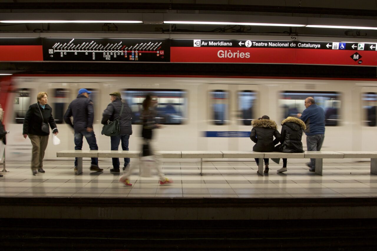 Train in motion in a subway station